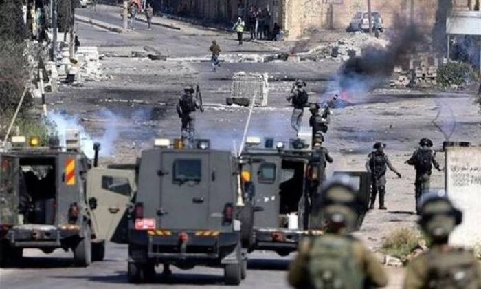 مواجهات متفرقة بالضفة تنديدا بالعمليات الإسرائيلية في غزة